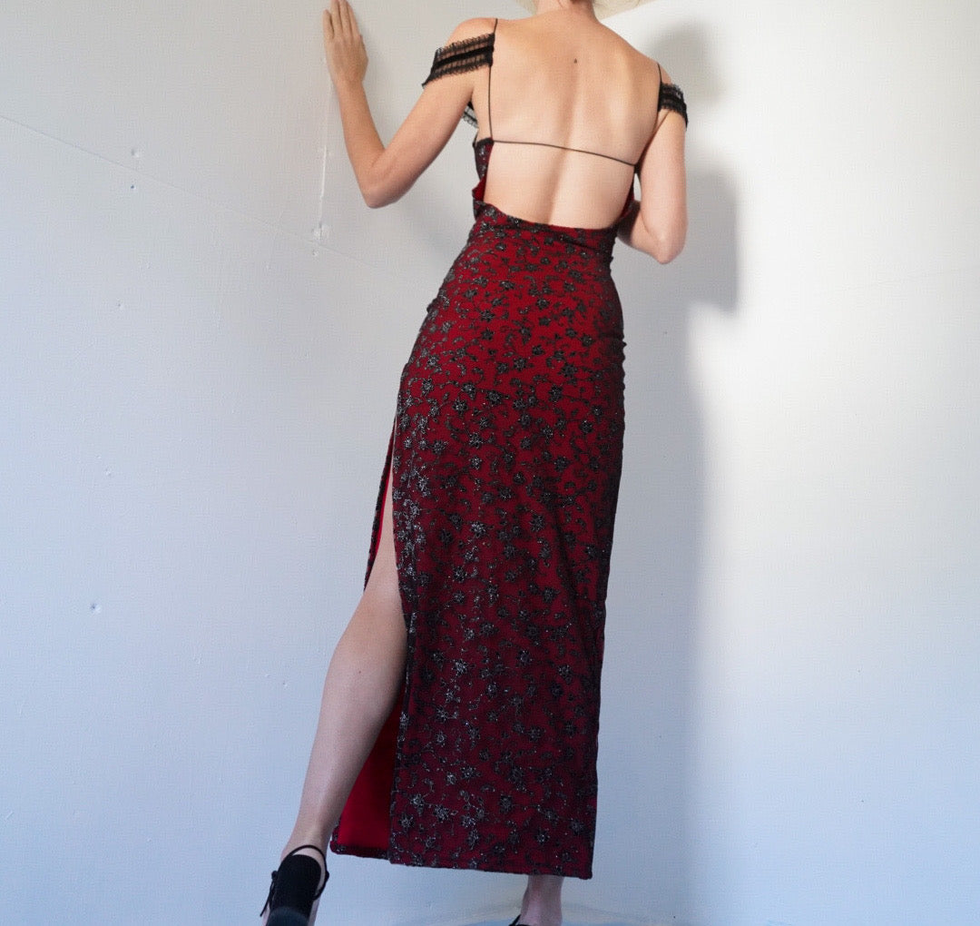 Handmade layered floral glitter gown.