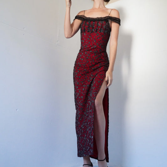 Handmade layered floral glitter gown.